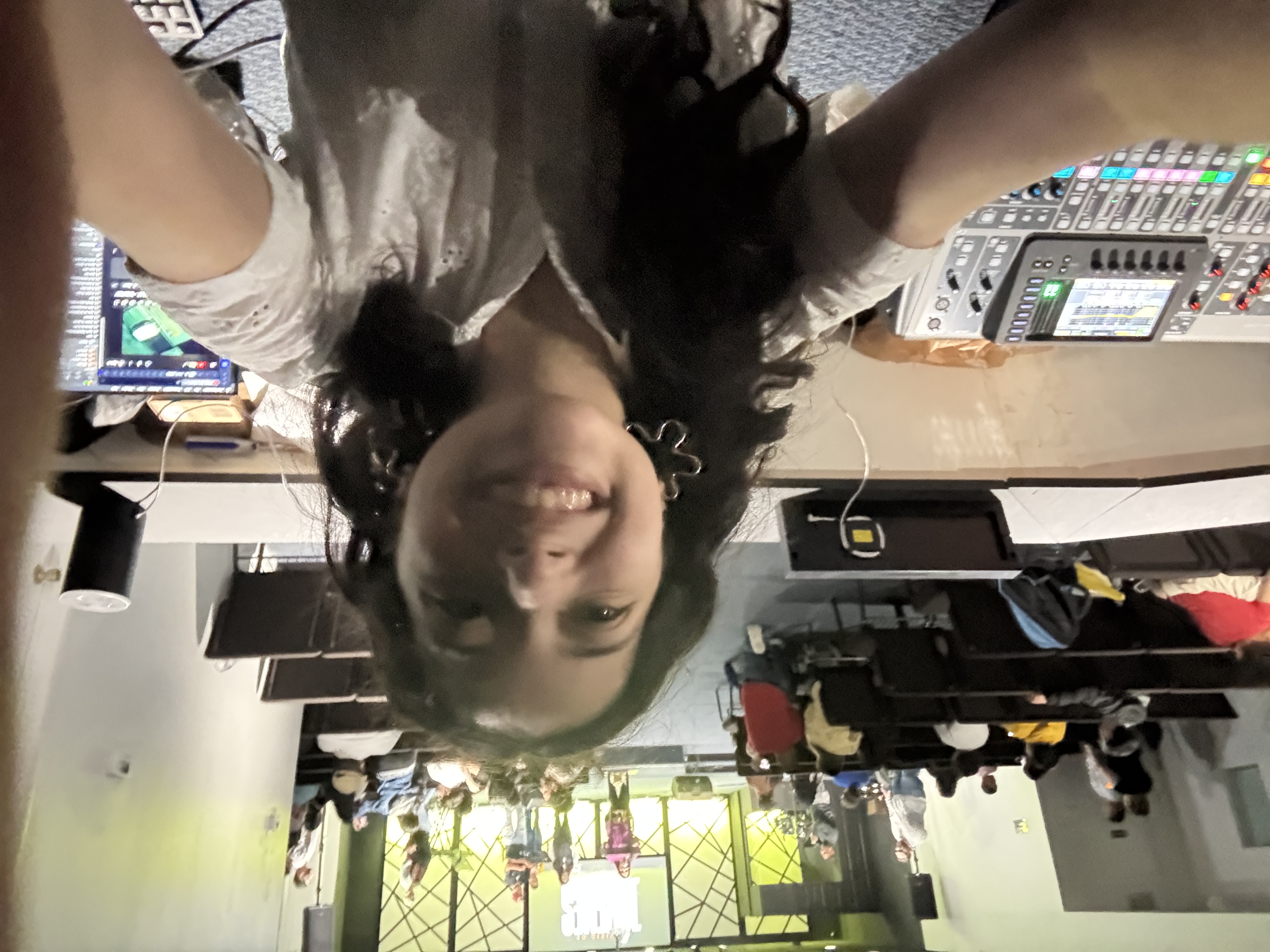 A selfie of me in the sound system booth of my church.