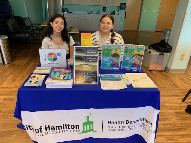 Me and my coworker at a Hamilton City Health Department event booth.